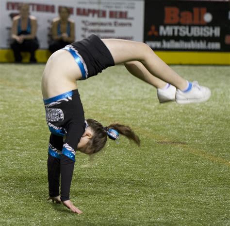 gymnast girl doing flips during the pregame show nathan rupert flickr