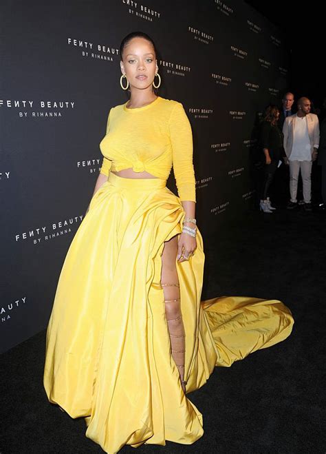 rihanna braless poking nipples in sheer yellow dress