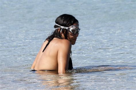 Michelle Rodriguez Wearing Skimpy Black Bikini At The Beach In Sardinia