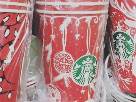 starbucks makes coffee cute with several red cup designs for the