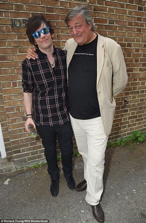 stephen fry enjoys yeo s summer party with husband elliot spencer