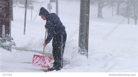man shoveling snow  stock video footage
