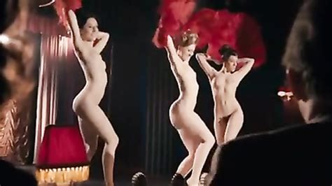 cabaret performers get naked and dance on the stage