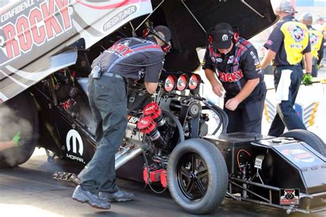 matt hagen and team in the rocky boots and mopar at the 2014 zmax drag way don schumacher