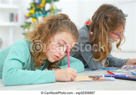 young girls drawing canstock