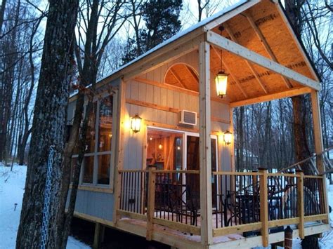 single mom builds  grid lakeside cabin  columbus ohio tinyhousedesign