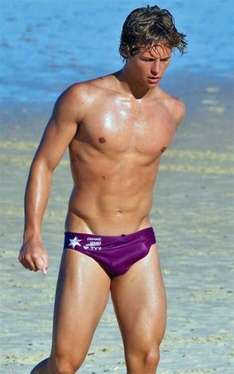 Cute And Sexy Guy In The Beach Water Sand And Sun