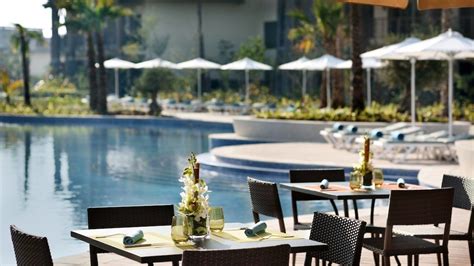 lapita hotel poolside resort house styles seating area