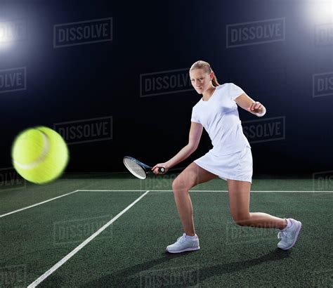 tennis player hitting ball  court stock photo dissolve
