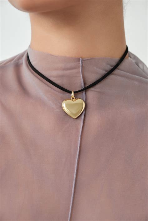suki jewelry heart locket