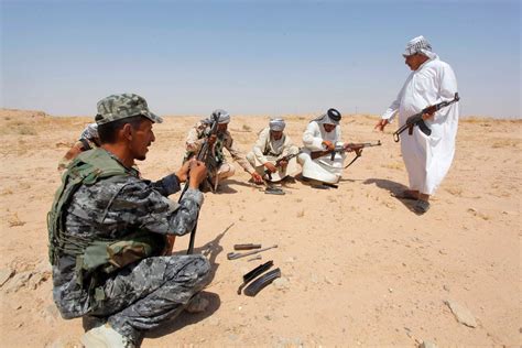 iraqi army   show  force drives  insurgents  major city
