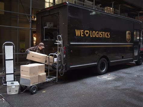ups drivers  making deliveries   haul trucks business insider