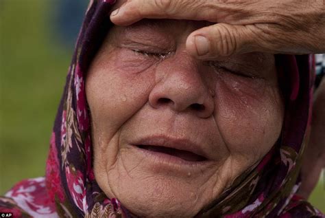 families lay 175 newly identified srebrenica victims to rest as town
