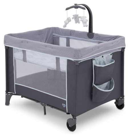lx deluxe portable baby play yard  removable bassinet  changing