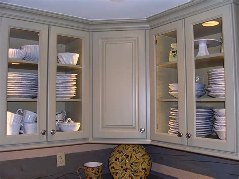 modern white kitchen cabinets  glass doors  kitchen interior