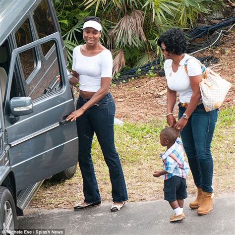 venus williams beams alongside her stepmother and half brother after