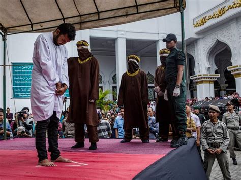 two gay men caned in indonesia for having sex au — australia