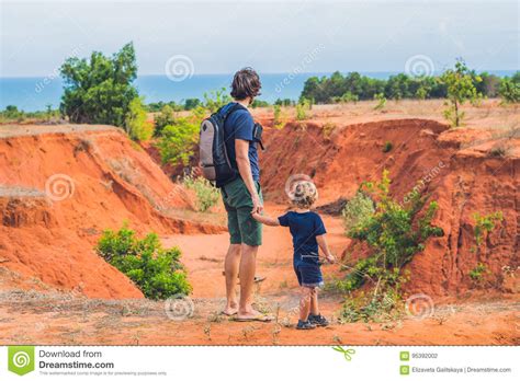father  son travelers  red canyon  mui ne southern vie stock