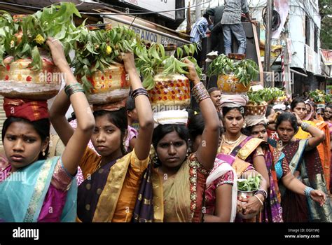 indian women carry bonam  bonalu  hindu festival  mahakali