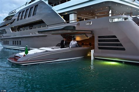 196 foot j ade mega yacht with world s first floating drive in garage daily mail online