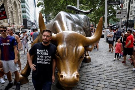 Wall Street Bull Covered In Dildos In Protest Against
