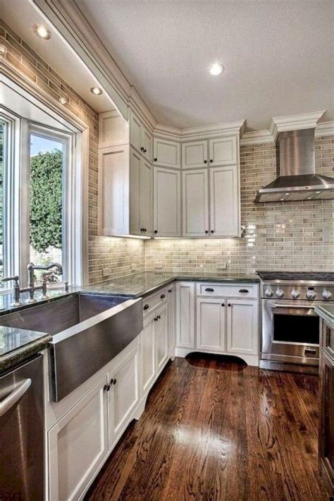 white kitchen cabinets  hardwood flooring image