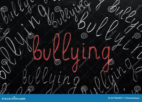 words bullying written  blackboard closeup view stock image