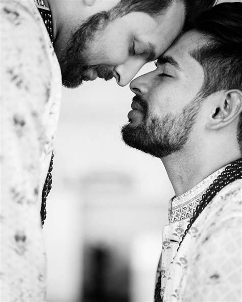 gay indian couple holds a traditional wedding ceremony in a hindu