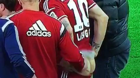 Dedicated Trainer Vigorously Rubs Soccer Player S Bare Butt During Game