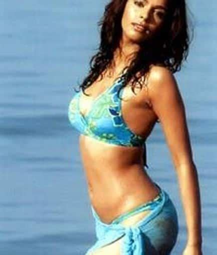 mallika sherawat poses in sexy swimwear at beach