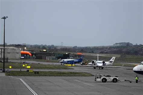 fears  helicopter    board  emergency services called  aberdeen airport