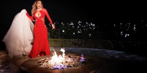 Watch Mariah Carey Casually Burn Her 250 000 Wedding Dress