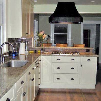oil rubbed bronze hardware  white cabinetsthis        kitchen