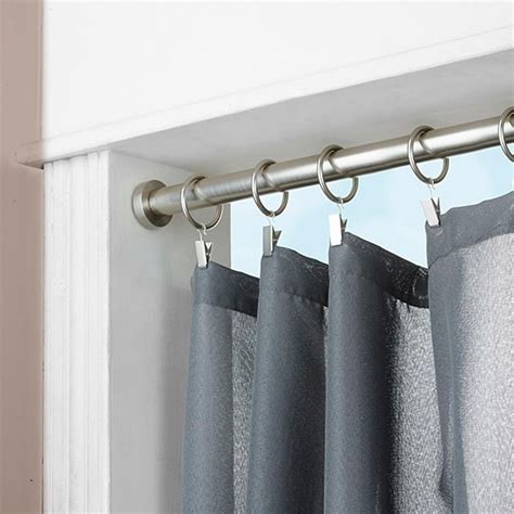spring loaded curtain poles