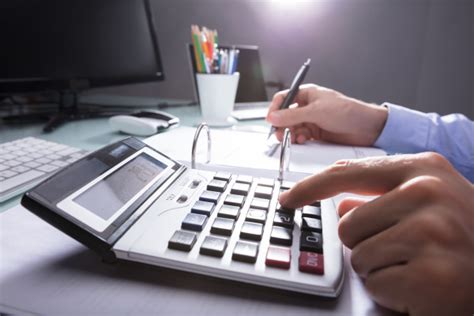 businessperson calculating receipt  calculator stock image  panthermedia stock