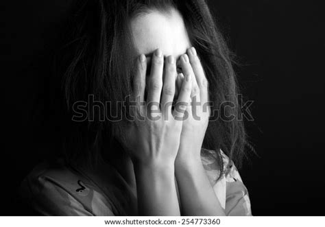 woman hiding  face hands monochrome stock photo edit