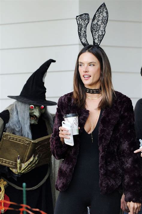 alessandra ambrosio wore bunny ears and a black jumpsuit as she went