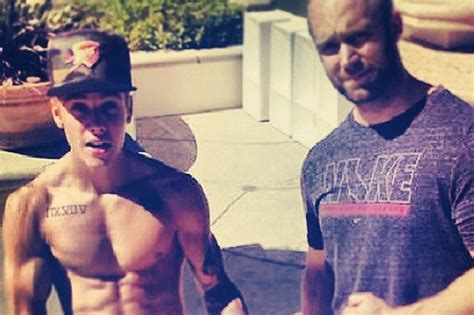 he s all grown up justin bieber shows off ripped physique with buff