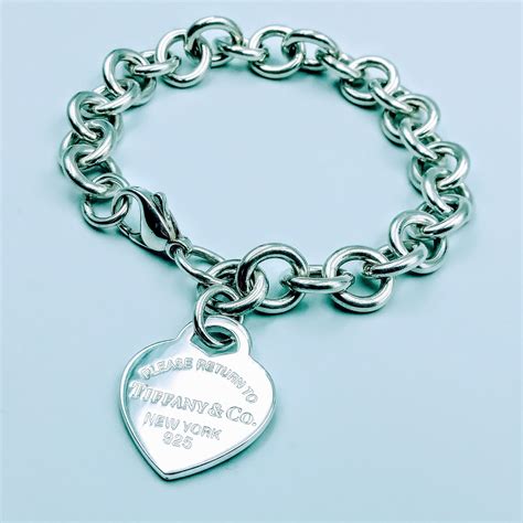 tiffany   return  tiffany  sterling silver heart charm bracelet