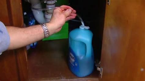 feed tube into liquid soap container for an easy refill of your soap dispenser simple
