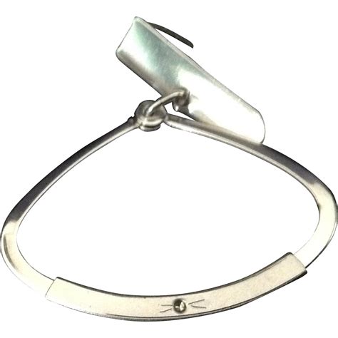 unusual adjustable silvertone tie ring  small rhinestone  carolynstt  ruby lane