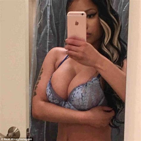 nicki minaj draws attention to her eye popping cleavage in extremely busty selfie daily mail
