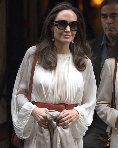 angelina jolie looks chic as she steps out in paris with