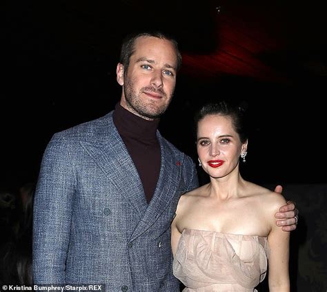 Felicity Jones Dons Blush Ball Gown As She Joins Armie Hammer At On The