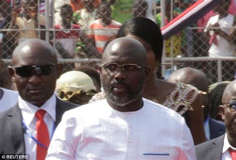 george weah sworn into office as liberia s new president daily mail online