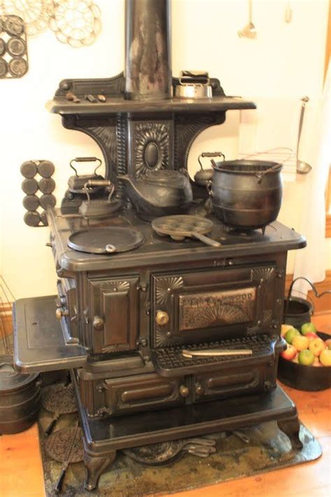 This Is An Old Fashioned Wood Burning Cooking Stove With All Of The