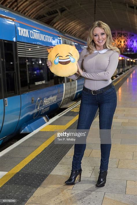 news photo carol vorderman poses for a photo with a happy tight