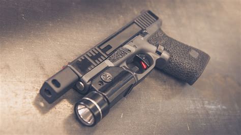 definitive guide  choosing pistol accessories    gunbrokercom