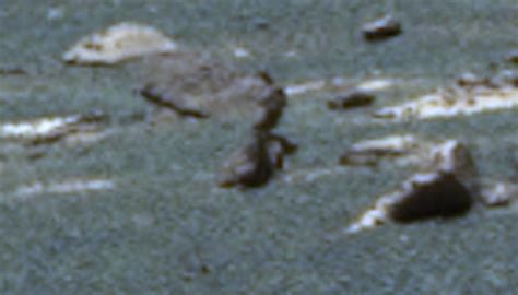 ufo sightings daily two figures on mars frozen in time