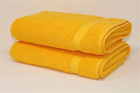 sanjaysunil yellow plain dyed towels size  rs  piece id